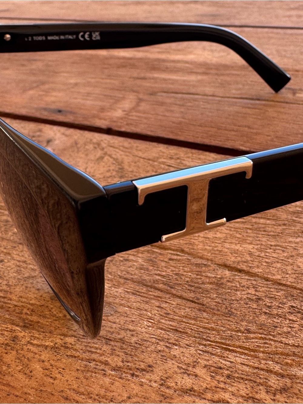 Tod's Black Round Sunglasses with Silver T Accent